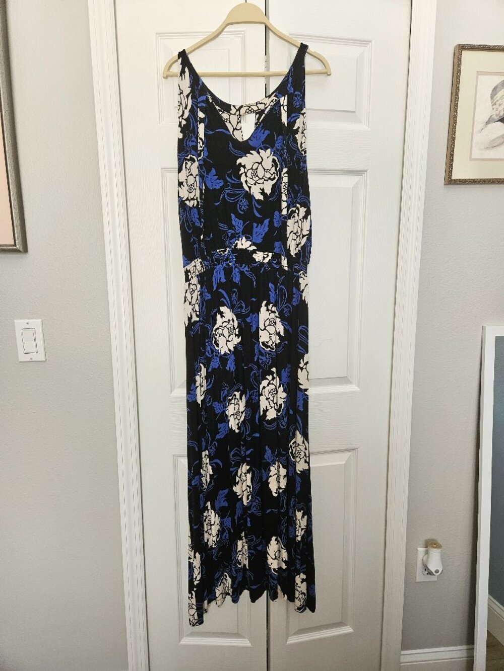 Black Sleeveless Dress with Blue and White Floral Designs